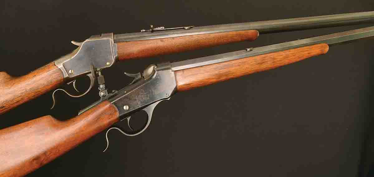 The Model 1885 High Wall .30-40 Krag (top) features more steel, greater support and strength to the breechblock when compared to the Low Wall .22 WCF (bottom), which handles smaller cartridges. Both rifles are late-production Winchesters (circa 1930).